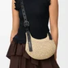 Mini Punch Hole Hobo van raffia en kalfsleer Mini Punch Hole Hobo van raffia en kalfsleer