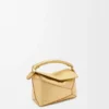 Mini Puzzle Edge-tas van gelamineerd lamsleer Mini Puzzle Edge-tas van gelamineerd lamsleer