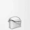 Mini Puzzle Edge-tas van gelamineerd lamsleer Mini Puzzle Edge-tas van gelamineerd lamsleer