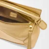 Mini Puzzle Edge-tas van gelamineerd lamsleer Mini Puzzle Edge-tas van gelamineerd lamsleer