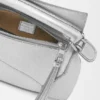 Mini Puzzle Edge-tas van gelamineerd lamsleer Mini Puzzle Edge-tas van gelamineerd lamsleer