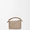 Mini Puzzle Edge-tas van zacht generfd kalfsleer Mini Puzzle Edge-tas van zacht generfd kalfsleer