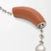 Mini Squeeze-tas van met kralen versierd leer Mini Squeeze-tas van met kralen versierd leer