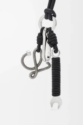 Multi Tool-bedeltje van messing en kalfsleer