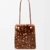 Pebble-etui van bedrukt schapenvacht Pebble-etui van bedrukt schapenvacht