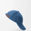 Pet met patch van denim Pet met patch van denim