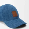 Pet met patch van denim Pet met patch van denim