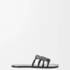 Petal Anagram-slipper van plantaardig gelooid kalfsleer met metallic studs Petal Anagram-slipper van plantaardig gelooid kalfsleer met metallic studs