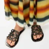 Petal Anagram-slipper van plantaardig gelooid kalfsleer met metallic studs Petal Anagram-slipper van plantaardig gelooid kalfsleer met metallic studs