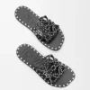 Petal Anagram-slipper van plantaardig gelooid kalfsleer met metallic studs Petal Anagram-slipper van plantaardig gelooid kalfsleer met metallic studs