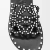 Petal Anagram-slipper van plantaardig gelooid kalfsleer met metallic studs Petal Anagram-slipper van plantaardig gelooid kalfsleer met metallic studs
