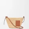 Pochette-tas met split van raffia en kalfsleer Pochette-tas met split van raffia en kalfsleer