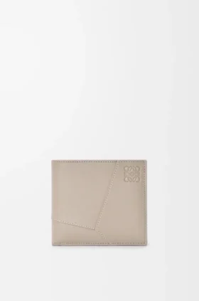Puzzle-portemonnee met twee vouwen voor munten, van klassiek kalfsleer