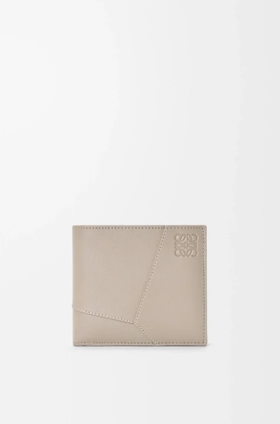 Puzzle-portemonnee met twee vouwen voor munten, van klassiek kalfsleer Puzzle-portemonnee met twee vouwen voor munten, van klassiek kalfsleer