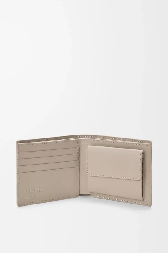 Puzzle-portemonnee met twee vouwen voor munten, van klassiek kalfsleer Puzzle-portemonnee met twee vouwen voor munten, van klassiek kalfsleer