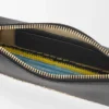 Rio-tasje van klassiek kalfsleer en raffia Rio-tasje van klassiek kalfsleer en raffia