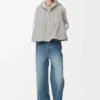 Vest met capuchon van schapenvacht Vest met capuchon van schapenvacht