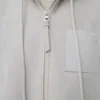 Vest met capuchon van schapenvacht Vest met capuchon van schapenvacht