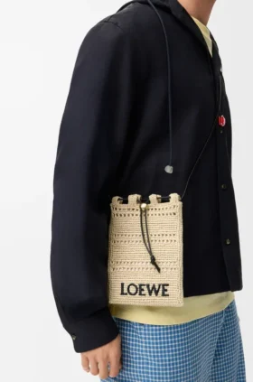 Zakje met trekkoord van raffia Zakje met trekkoord van raffia