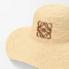 Zonnehoed van raffia en kalfsleer Zonnehoed van raffia en kalfsleer